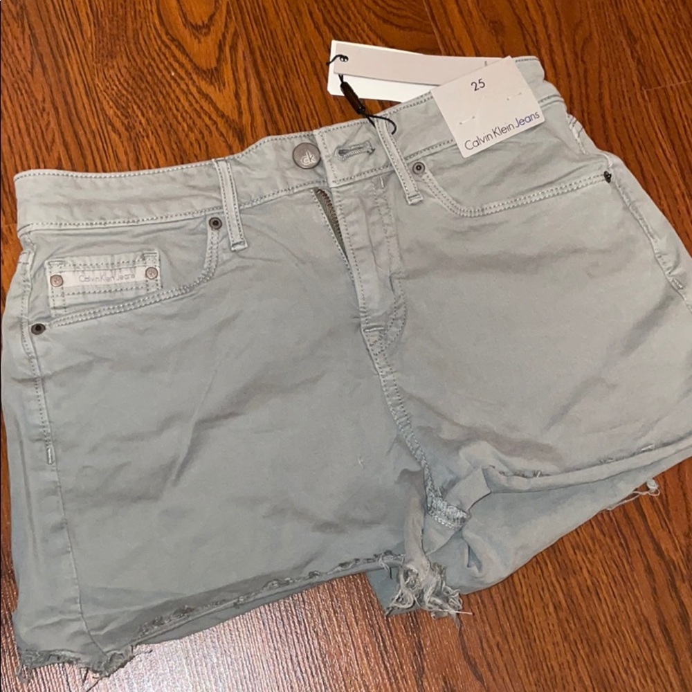 Green Calvin Klein shorts